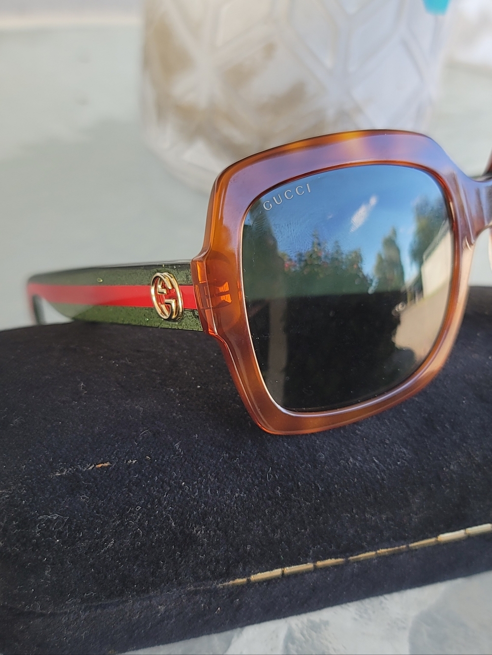 Gucci Women’s Tortoise Frame Sunglasses with Signature Stripe